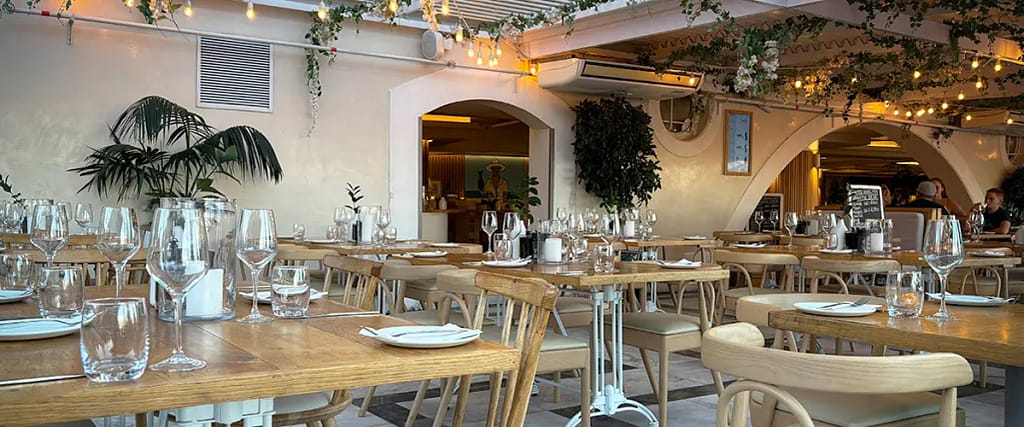 Elegant dining space with wood furniture and ambient lighting